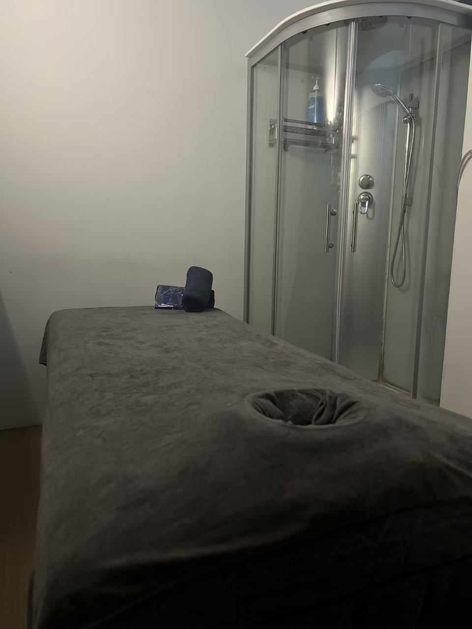 Treatment room with private shower